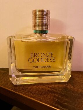 Estee Lauder Bronze Goddess Decorative Bottle in Gold and Green Accents